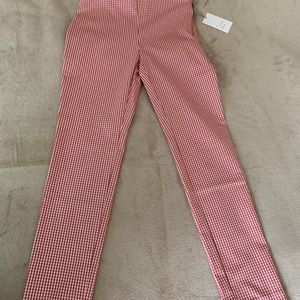 Woman’s Capri red pants.